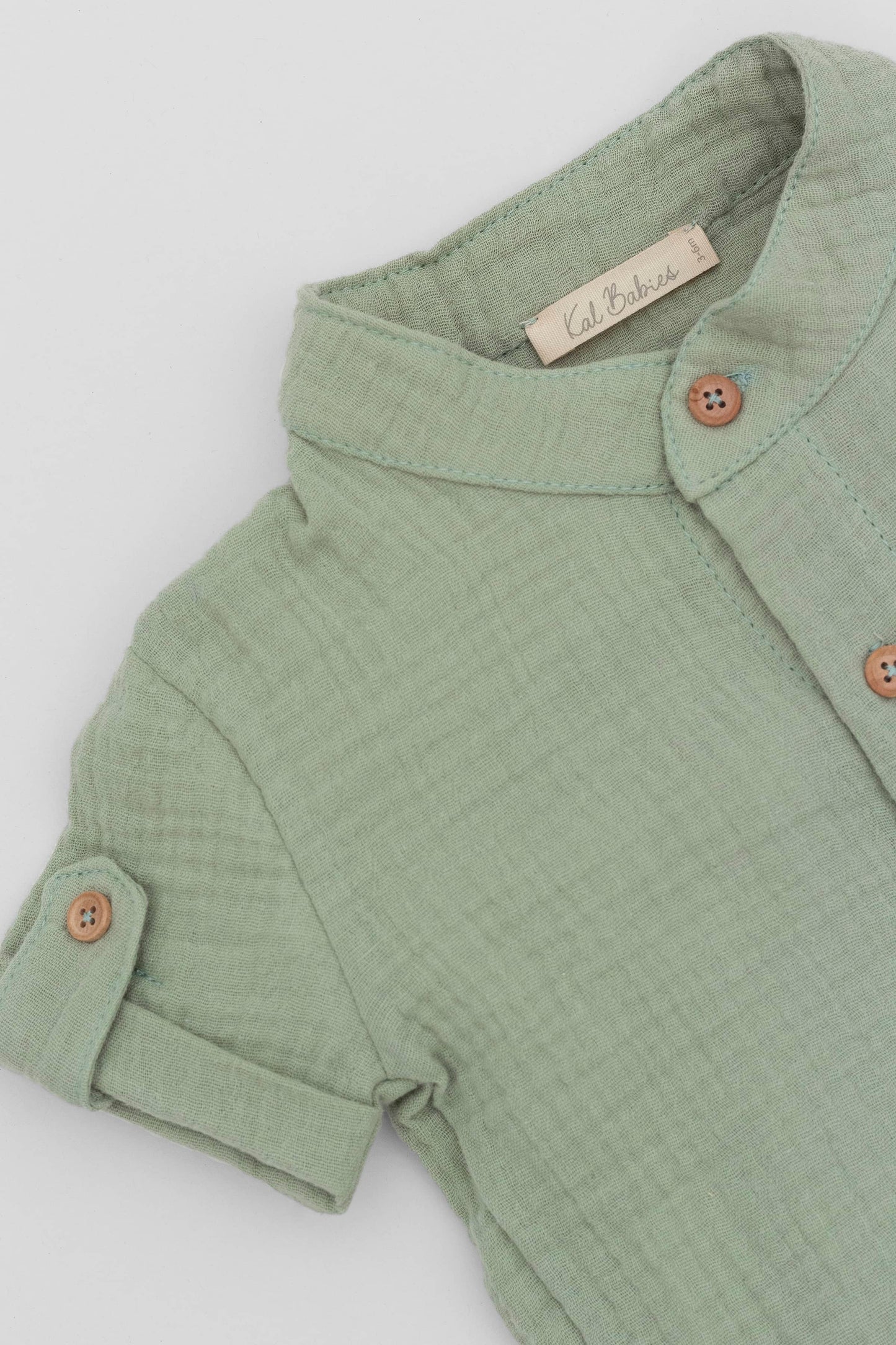 Organic muslin green shirt kal babies detail