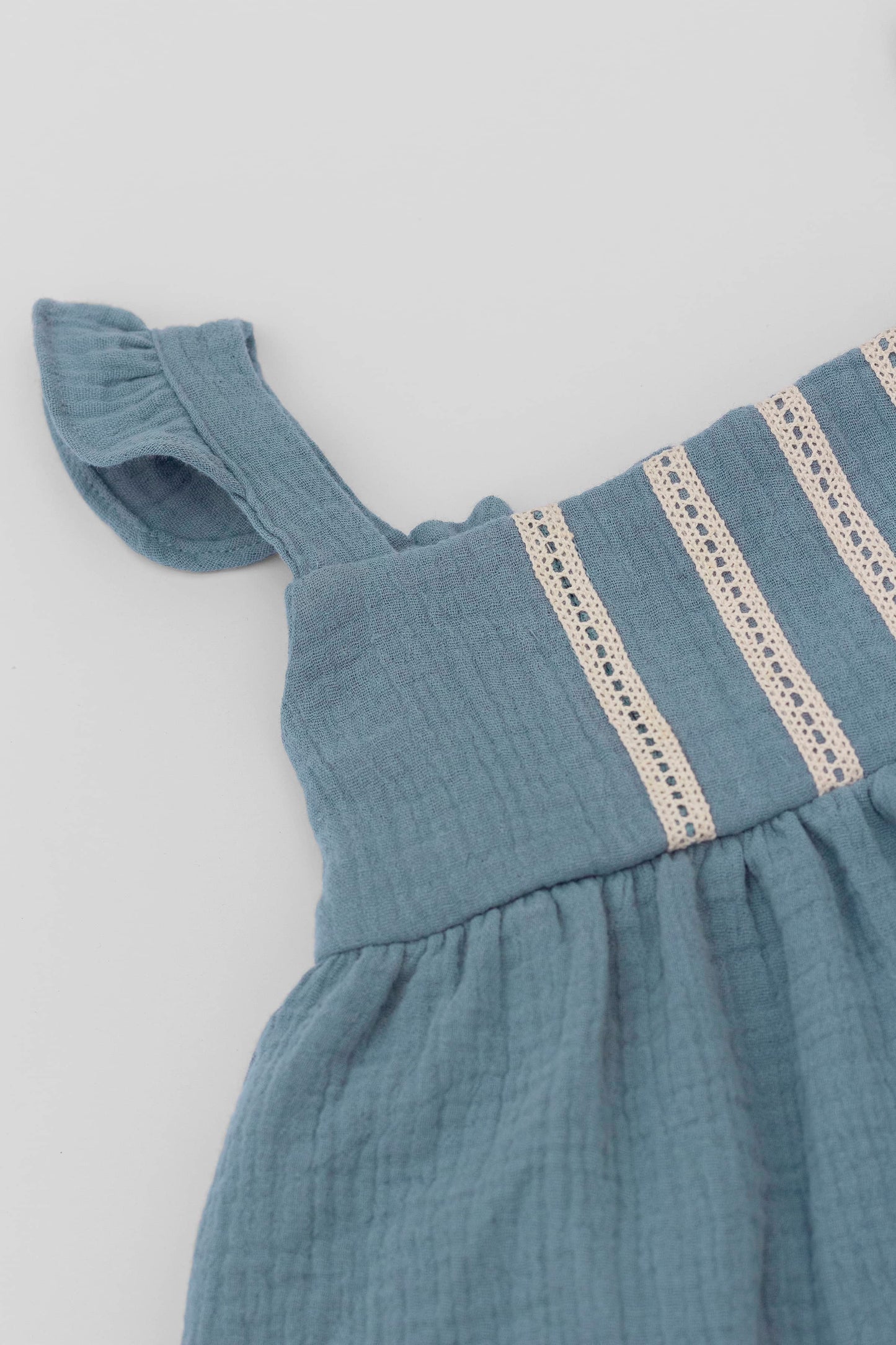 Blue organic cotton muslin dress with lace for baby girls ruffles detail