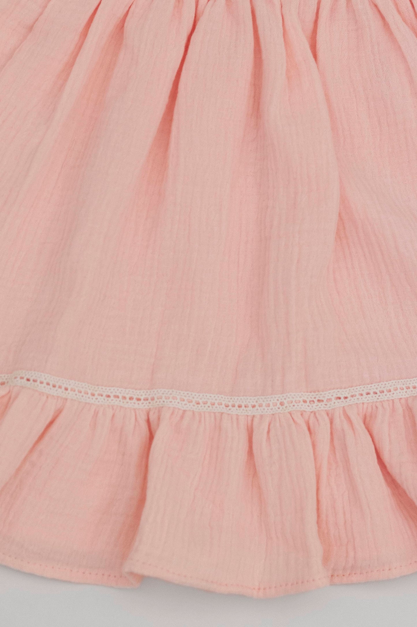 Salmon organic cotton muslin dress with lace for baby girls skirt detail