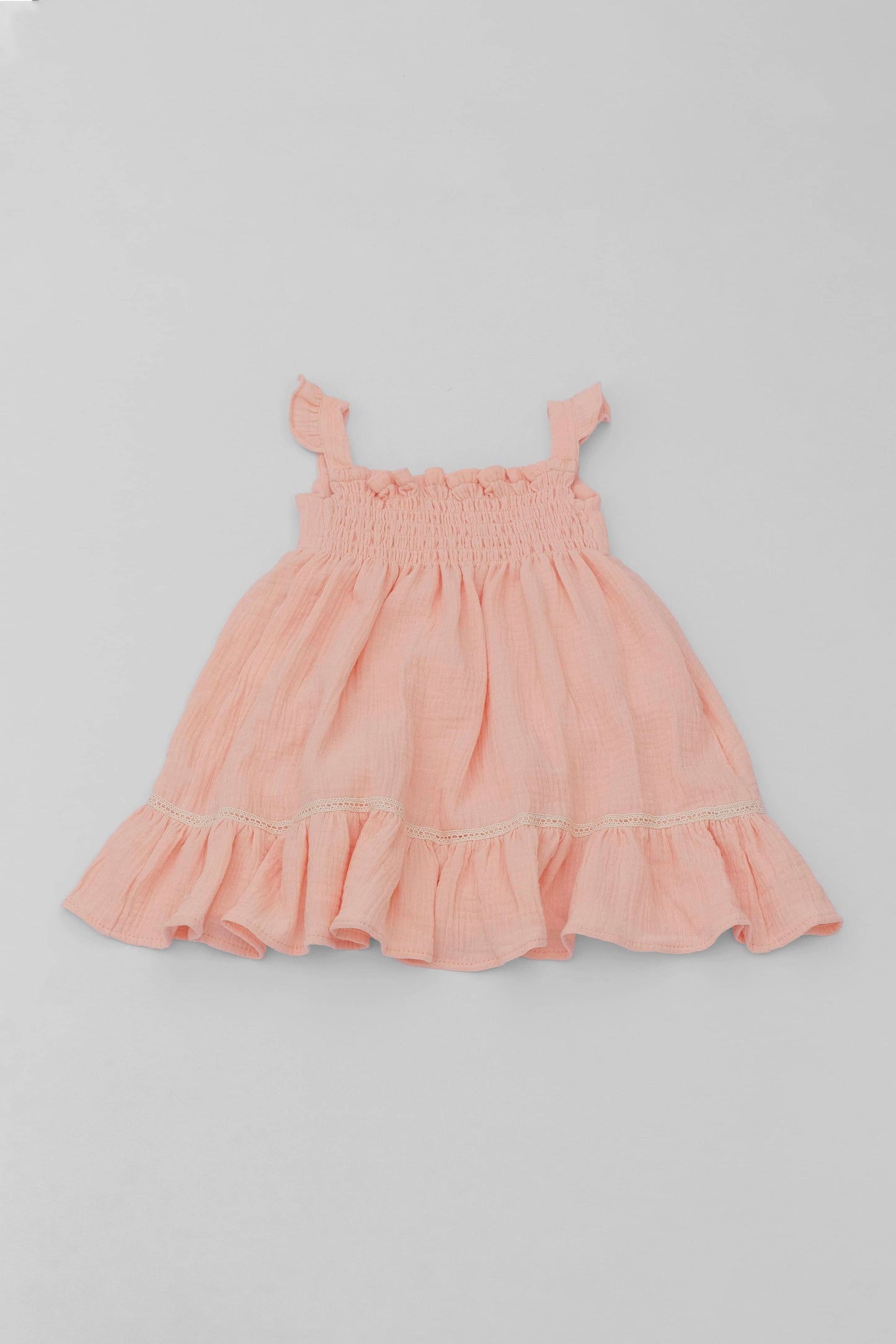 Salmon organic cotton muslin dress with lace for baby girls back view