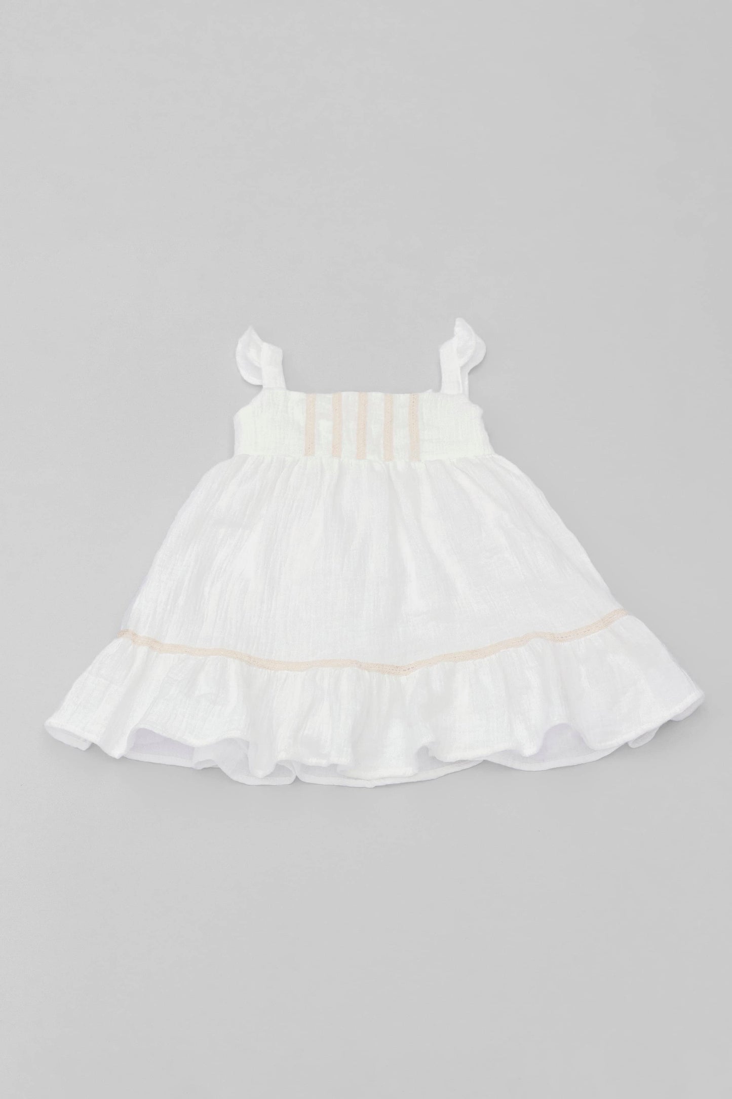 White organic cotton muslin dress with lace for baby girls front view