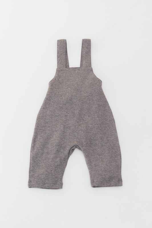 Organic-cotton overall with wooden buttons.
