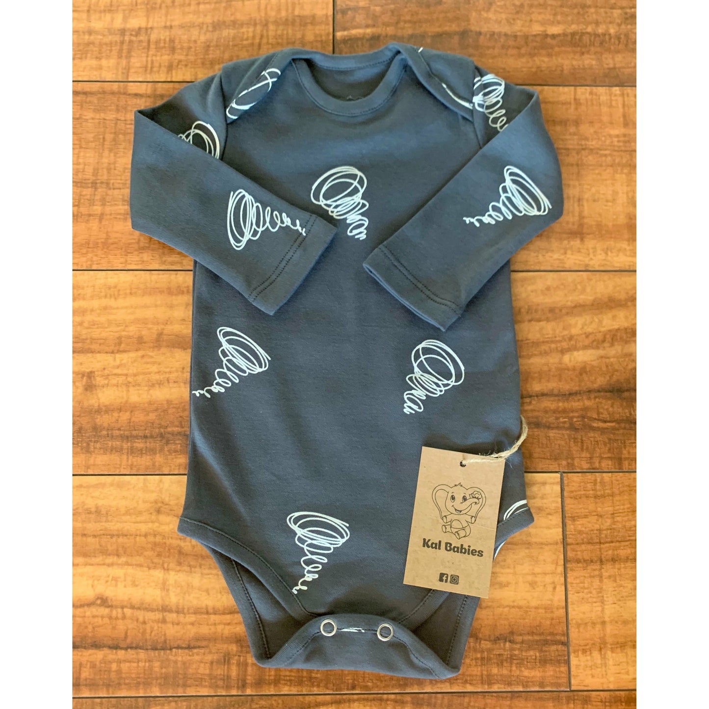 Twister lapped shoulder bodysuit - Kal BabiesTwister lapped shoulder bodysuit