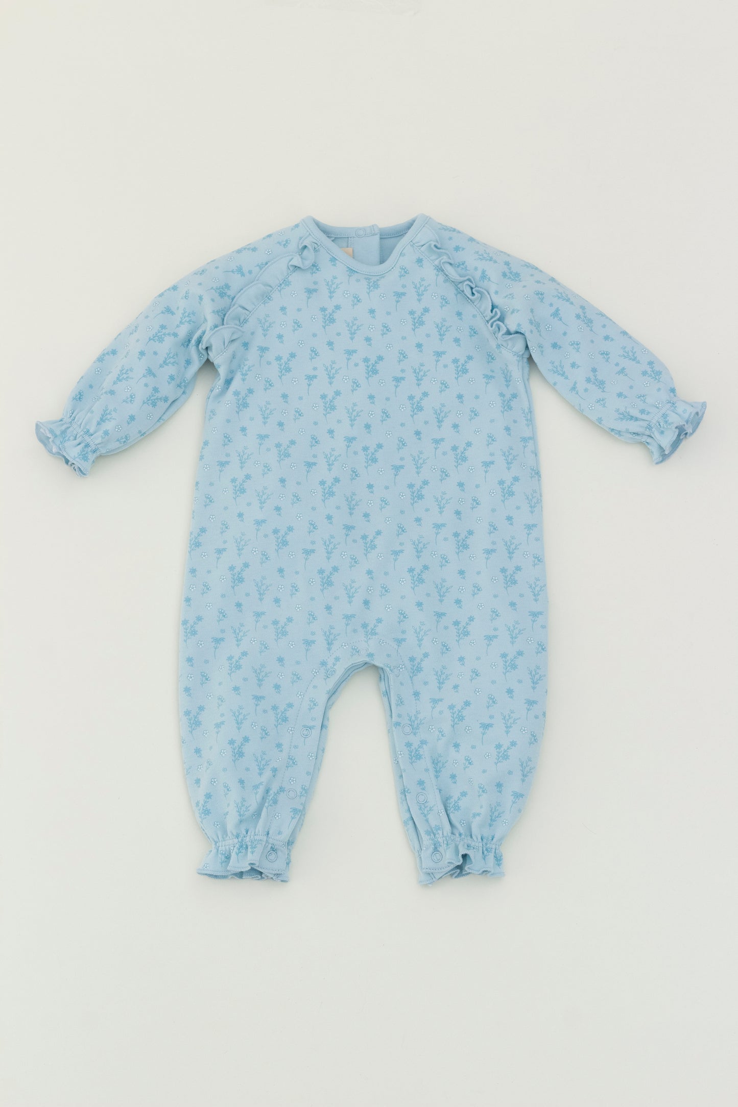 Light blue long sleeve romper with flower print