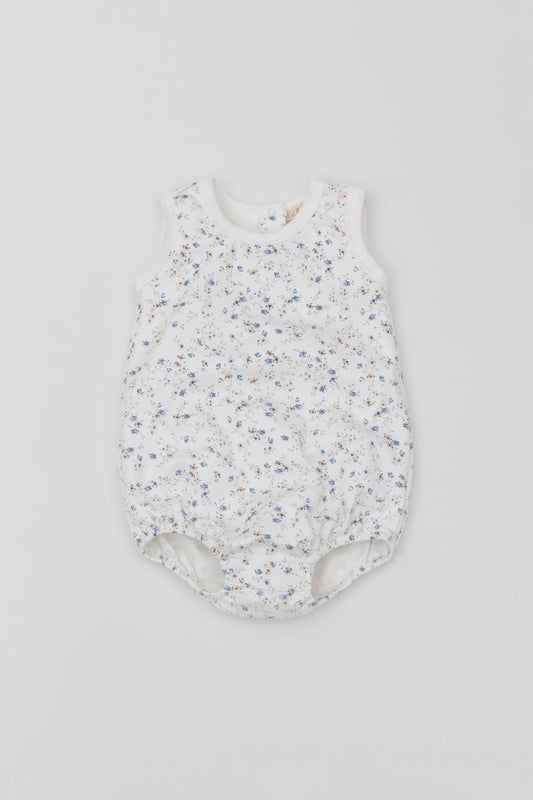 Organic pima cotton baby bubble, floral printing and contrast piping in eco white. Front view