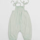 Smocked mint green organic romper with straps and embroidery - back