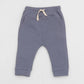 Blue moon joggers with elasticized waist, drawstring and kangaroo pocket. Front