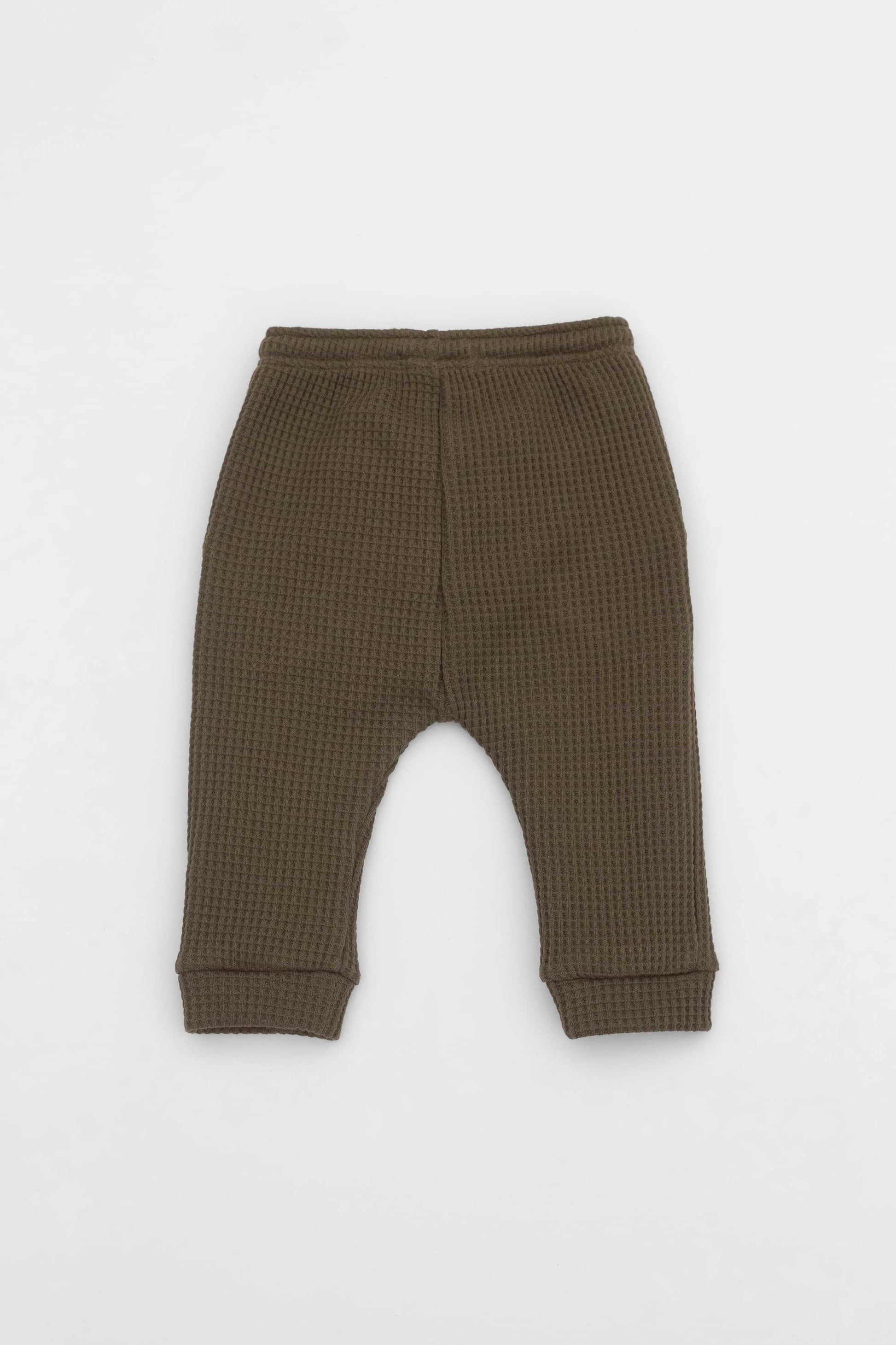 Olive joggers with elasticized waist, drawstring and kangaroo pocket. Back