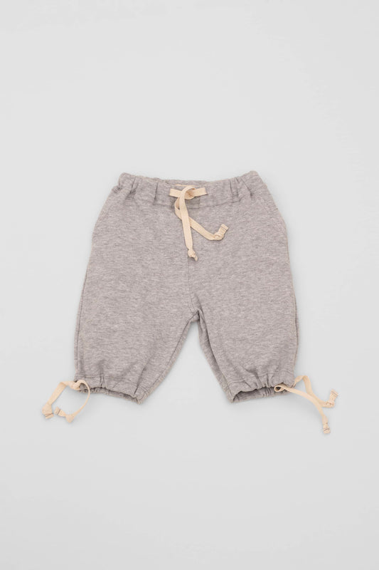 Grey organic pima cotton bermuda shorts with elasticized waist and fake pockets. Front view