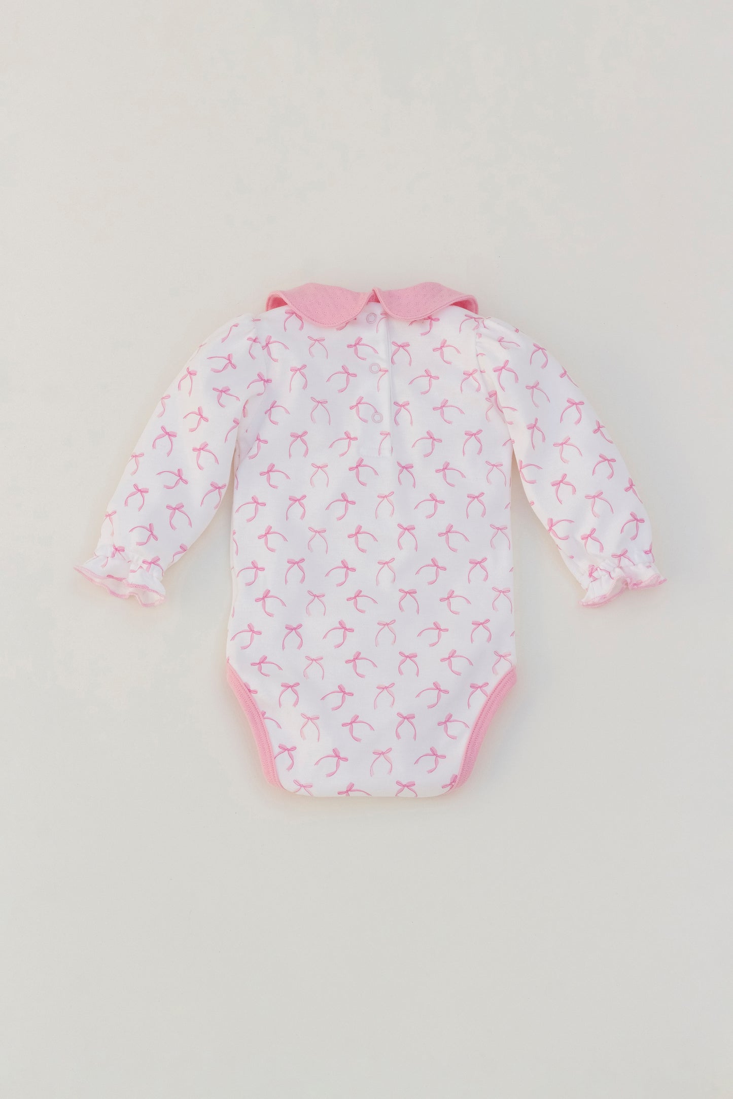 Long sleeve ribbons bodysuit with pink collar