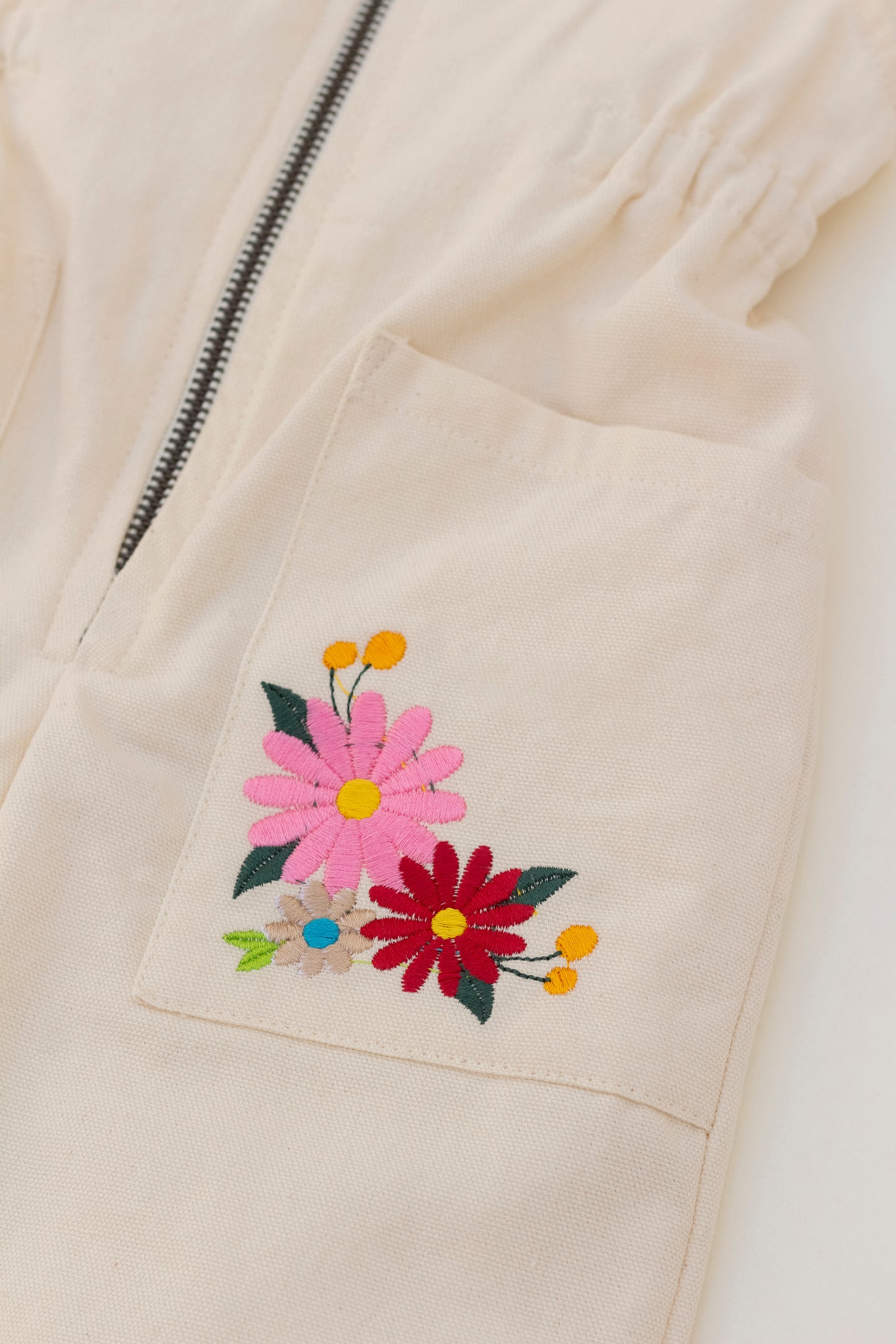 Overall Ivory with  embroidered flowers
