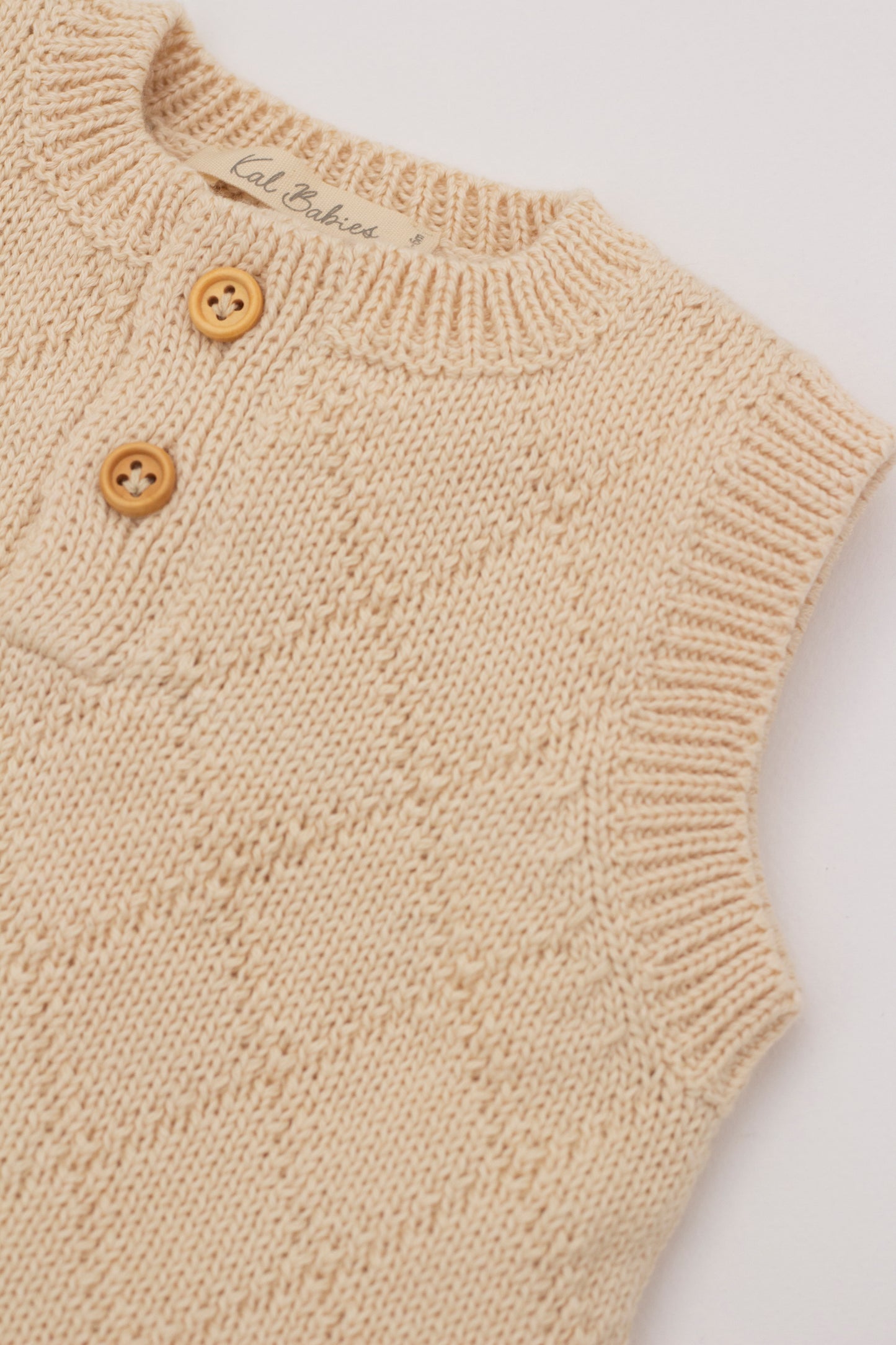 Knitted romper Beige