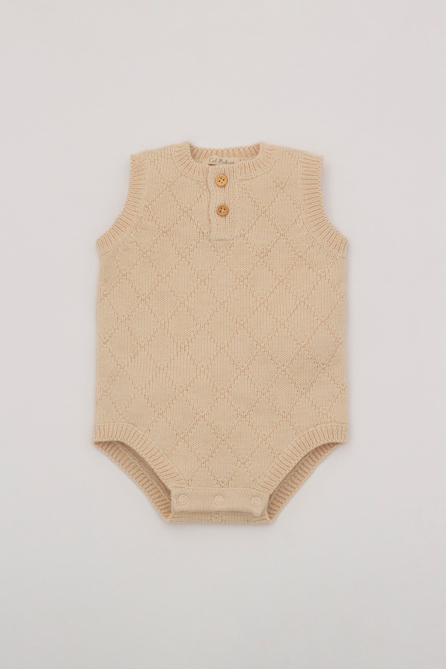 Knitted romper Beige