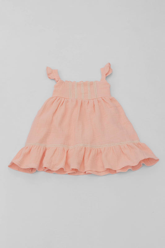 Salmon organic cotton muslin dress with lace for baby girls front view
