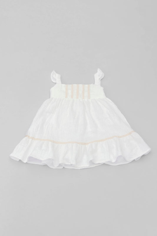 White organic cotton muslin dress with lace for baby girls front view