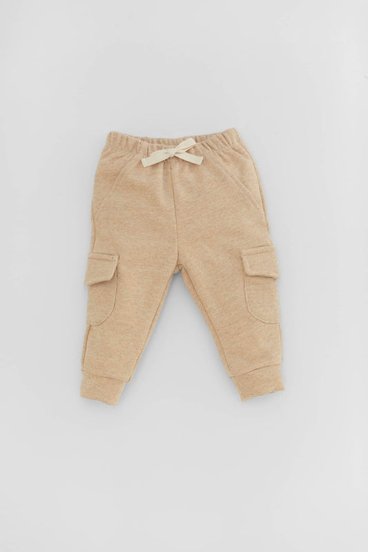Pull-on camel cargo pants. Elastic waistband. Fake front pockets and closure on the front. Front view